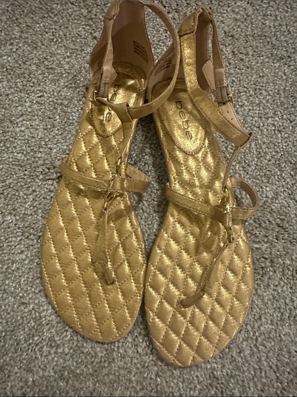 bebe Gold Quilted T-Strap Sandals